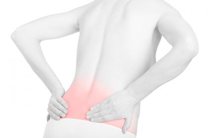 Young adult woman with back pain